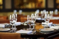 Relax at the bar with a cool drink before your guests arrive.